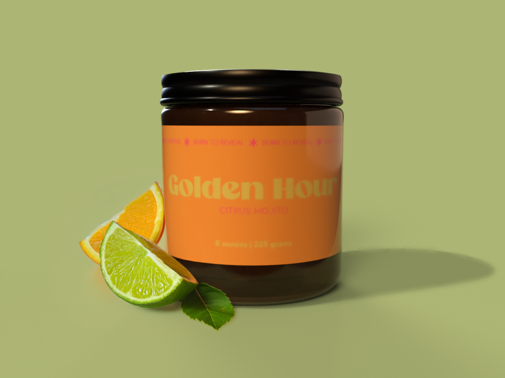 Candle featuring the scent. Candle is in the middle of the frame with black metal lid on. On the side are a couple slives of orange, lime and a mint leaf. Indicating the citrus mojito candle scent.