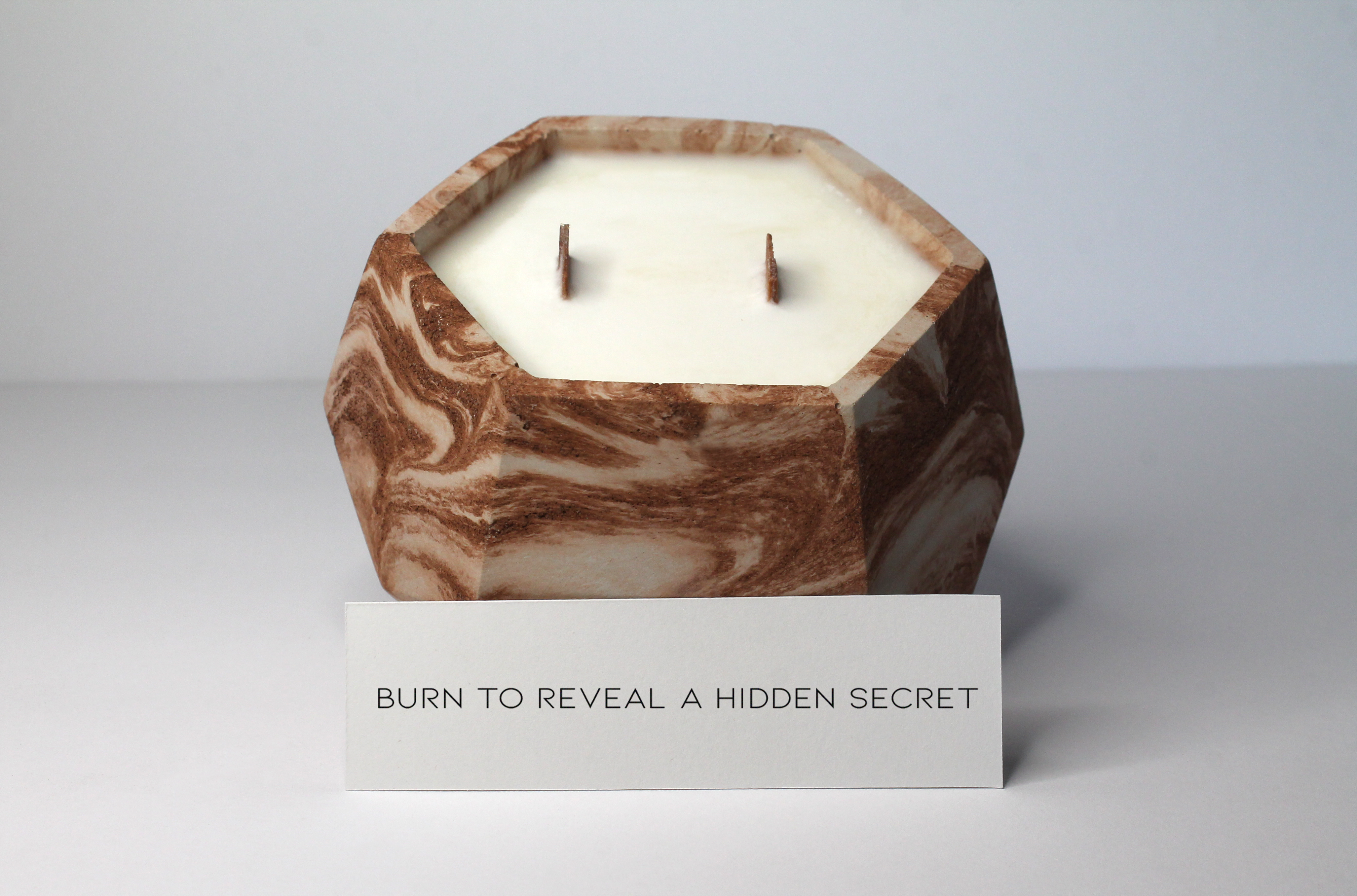 Hidden inside of all of our candles is a confession that has been sent in by strangers from around the world. Burn to reveal a hidden secret. 