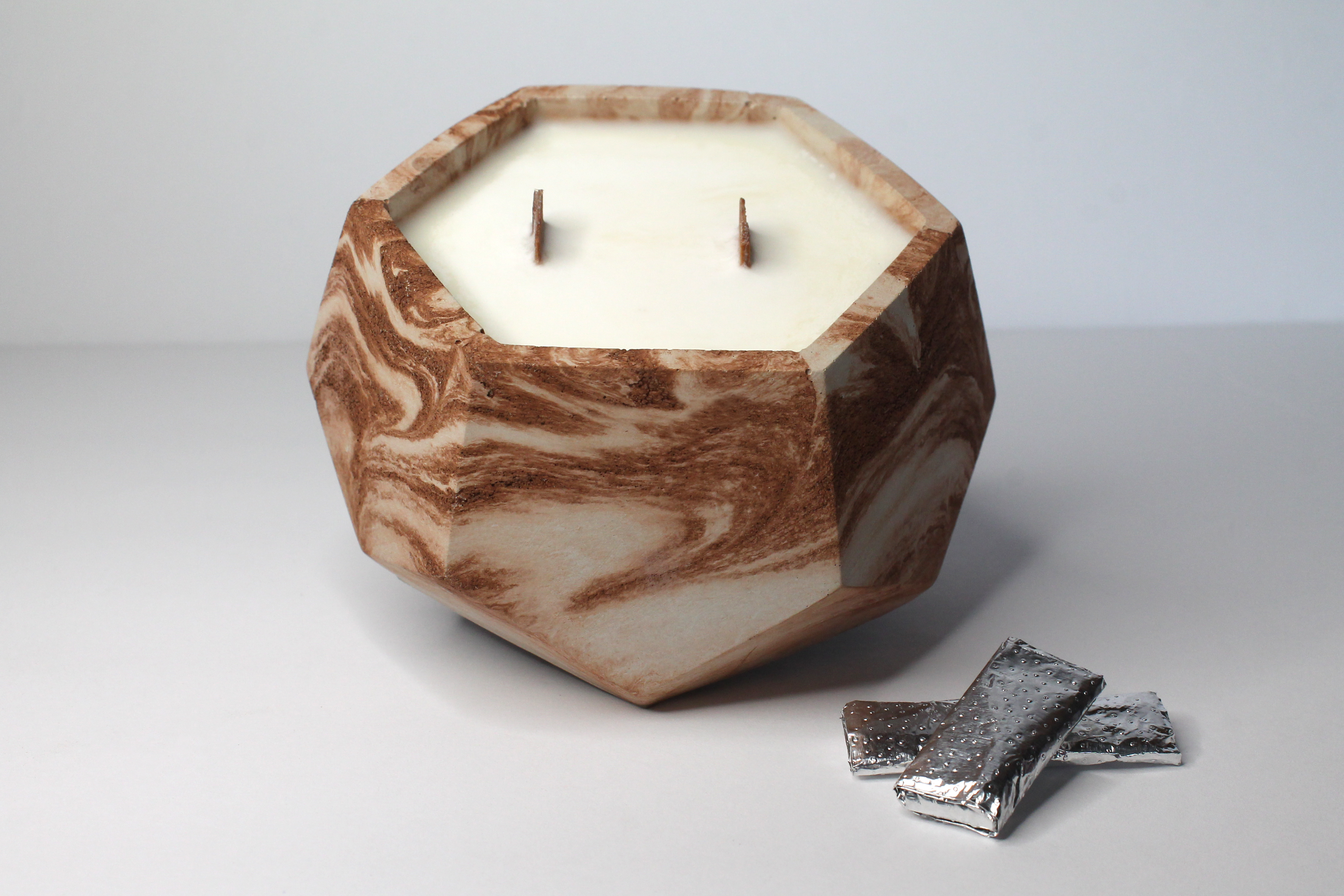 Concrete copper marble candle made with 100% soy wax and a double wooden wick.